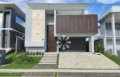 Imagem: A casa em condomínio possui 4 Dormitórios, 3 Banheiros, 2