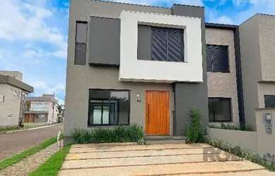 Imagem: A casa em condomínio possui 3 Dormitórios, 3 Banheiros, 2