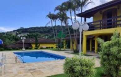 Imagem: A casa em condomínio possui 5 Dormitórios, 5 Banheiros, 3