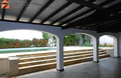 Imagem: A casa possui 3 Dormitórios, 4 Banheiros, 4 Vagas na garagem