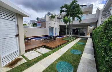 Imagem: A casa em condomínio possui 5 Dormitórios, 5 Banheiros, 4