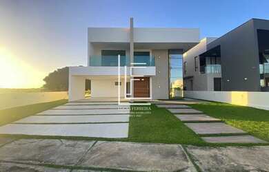 Imagem: A casa possui 4 Dormitórios, 4 Banheiros, 2 Vagas na garagem