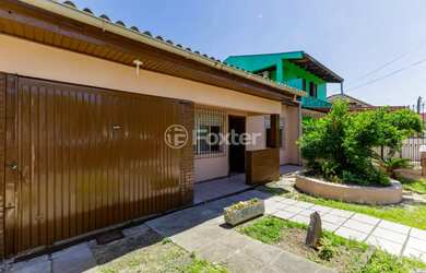 Imagem: A casa possui 3 Dormitórios, 1 Banheiro, 1 Vaga na garagem