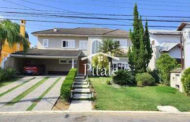 Imagem: A casa em condomínio possui 4 Dormitórios, 4 Banheiros, 3