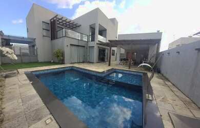 Imagem: A casa em condomínio possui 4 Dormitórios, 5 Banheiros, 3