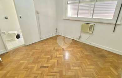 Imagem 12: Sala e quarto em prédio familiar bem administrado em frente ao Aterro...