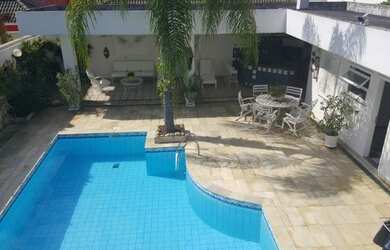 Imagem: A casa em condomínio possui 4 Dormitórios, 5 Banheiros, 4