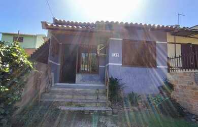 Imagem: A casa possui 2 Dormitórios, 1 Banheiro, 1 Vaga na garagem