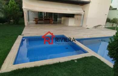 Imagem: A casa em condomínio possui 4 Dormitórios, 5 Banheiros, 4