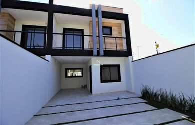 Imagem: A casa possui 3 Dormitórios, 2 Banheiros, 2 Vagas na garagem