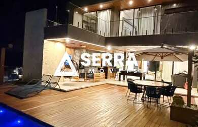 Imagem: A casa em condomínio possui 4 Dormitórios, 5 Banheiros, 425m²