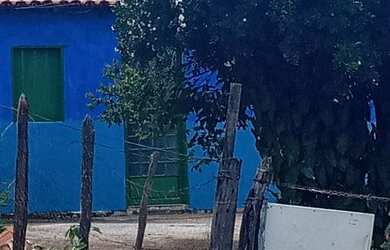 Imagem: A casa possui 4 Dormitórios, 1 Banheiro, 1 Vaga na garagem