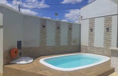 Imagem: A casa possui 3 Dormitórios, 3 Banheiros, 3 Vagas na garagem