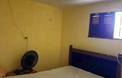 Imagem: A casa possui 3 Dormitórios, 2 Banheiros, 3 Vagas na garagem