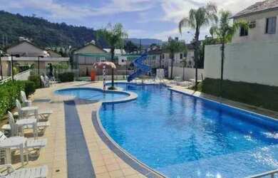 Imagem: A casa em condomínio possui 2 Dormitórios, 2 Banheiros, 1