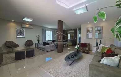 Imagem: A casa possui 4 Dormitórios, 5 Banheiros, 5 Vagas na garagem