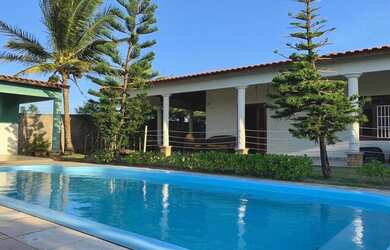 Imagem: A casa possui 3 Dormitórios, 5 Vagas na garagem e está localizado