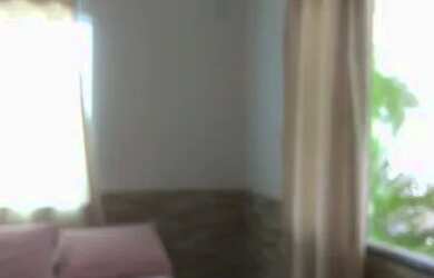 Imagem: A casa possui 2 Dormitórios, 2 Banheiros, 2 Vagas na garagem