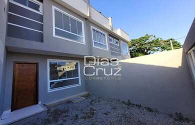 Imagem: A casa possui 3 Dormitórios, 3 Banheiros, 1 Vaga na garagem