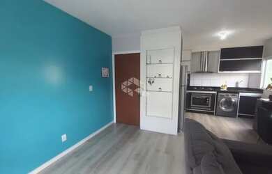 Imagem: O apartamento possui 2 Dormitórios, 1 Banheiro, 1 Vaga na garagem