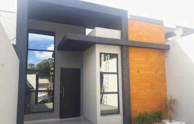 Imagem: A casa possui 3 Dormitórios, 2 Banheiros, 2 Vagas na garagem