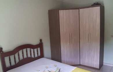 Imagem: A casa possui 3 Dormitórios, 4 Banheiros, 4 Vagas na garagem