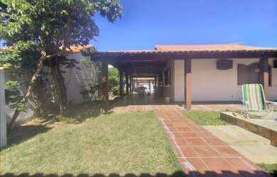 Imagem: A casa possui 3 Dormitórios, 3 Banheiros, 3 Vagas na garagem