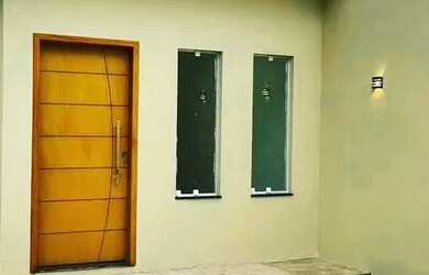 Imagem: A casa possui 3 Dormitórios, 2 Banheiros, 2 Vagas na garagem