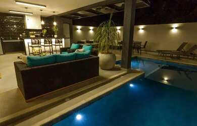 Imagem: A casa em condomínio possui 4 Dormitórios, 5 Banheiros, 3