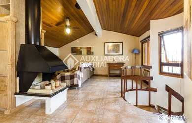 Imagem: A casa em condomínio possui 3 Dormitórios, 2 Banheiros, 2