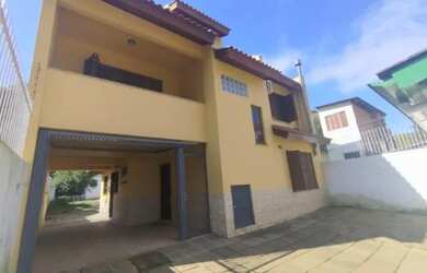 Imagem: A casa possui 5 Dormitórios, 5 Banheiros, 3 Vagas na garagem