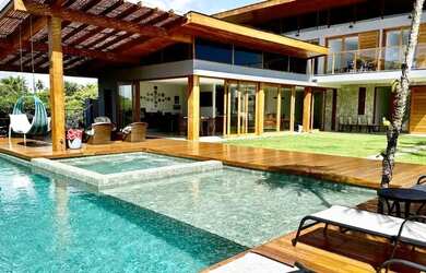 Imagem: A casa em condomínio possui 5 Dormitórios, 5 Banheiros, 5