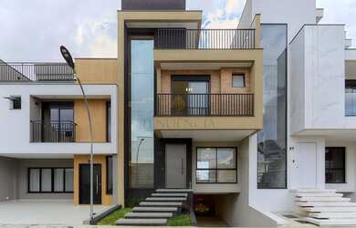 Imagem: A casa possui 3 Dormitórios, 5 Banheiros, 5 Vagas na garagem