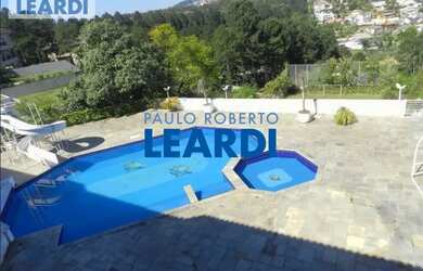 Imagem: A casa em condomínio possui 5 Dormitórios, 5 Banheiros, 5