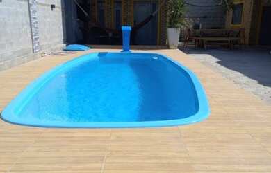 Imagem: A casa possui 2 Dormitórios, 2 Banheiros, 5 Vagas na garagem