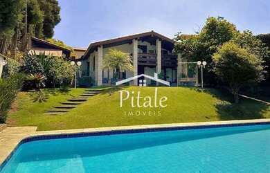 Imagem: A casa em condomínio possui 5 Dormitórios, 5 Banheiros, 5