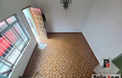 Imagem: A casa possui 4 Dormitórios, 2 Banheiros, 1 Vaga na garagem