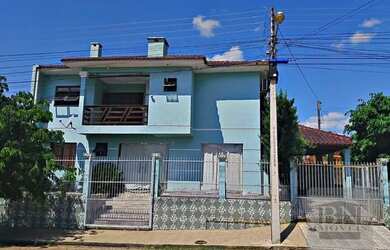 Imagem: A casa à venda possui 3 Dormitórios, 2 Banheiros, 1 Vaga na