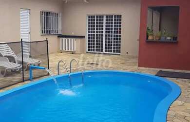 Imagem: A casa possui 3 Dormitórios, 4 Banheiros, 3 Vagas na garagem