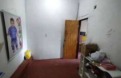 Imagem: A casa possui 3 Dormitórios, 1 Banheiro e está localizado