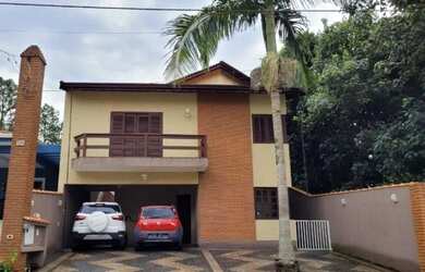 Imagem: A casa em condomínio possui 4 Dormitórios, 5 Banheiros, 5