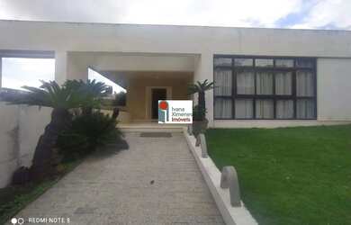 Imagem: A casa possui 4 Dormitórios, 5 Banheiros, 5 Vagas na garagem