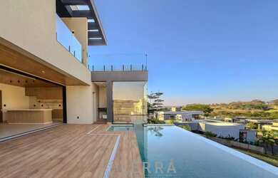 Imagem: A casa em condomínio possui 5 Dormitórios, 5 Banheiros, 4