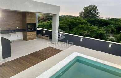 Imagem: A casa possui 3 Dormitórios, 5 Banheiros, 4 Vagas na garagem