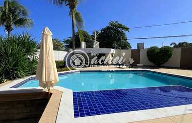 Imagem: A casa possui 5 Dormitórios, 5 Banheiros, 5 Vagas na garagem