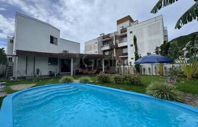 Imagem: A casa possui 3 Dormitórios, 3 Banheiros, 3 Vagas na garagem