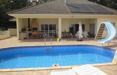 Imagem: A casa em condomínio possui 4 Dormitórios, 5 Banheiros, 5