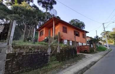 Imagem: A casa possui 3 Dormitórios, 1 Banheiro e 102m² de Área e