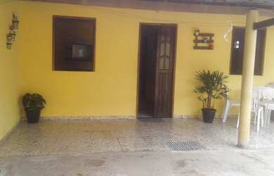 Imagem: A casa possui 3 Dormitórios, 2 Vagas na garagem e está localizado