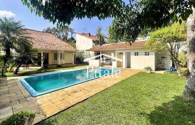 Imagem: A casa em condomínio possui 4 Dormitórios, 5 Banheiros, 4